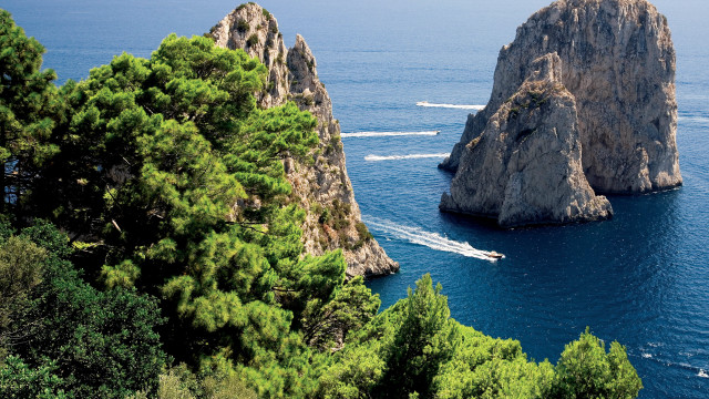 Boat rocks trees bay landscape free wallpaper for desktop - medium preview image