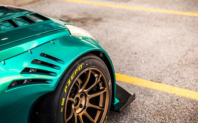 Green sports car yellow stripe #3 free wallpaper for desktop - medium preview image