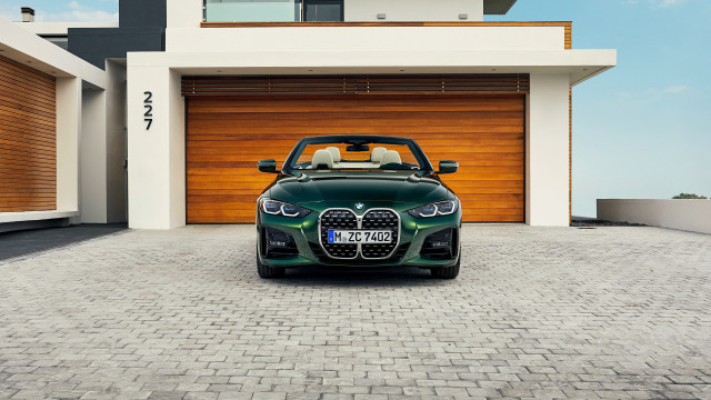 Green car garage brown door free wallpaper for desktop - medium preview image