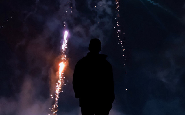 Fireworks man starry night city free wallpaper for desktop - medium preview image