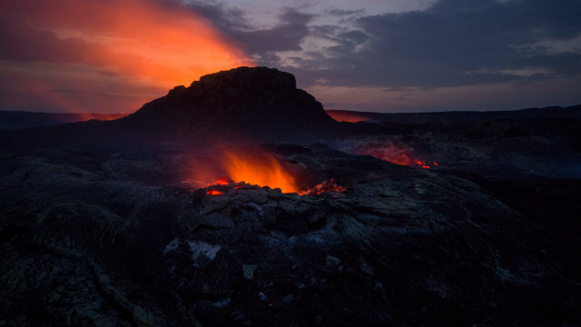 Lava orange glow mountain clouds free wallpaper for desktop - medium preview image