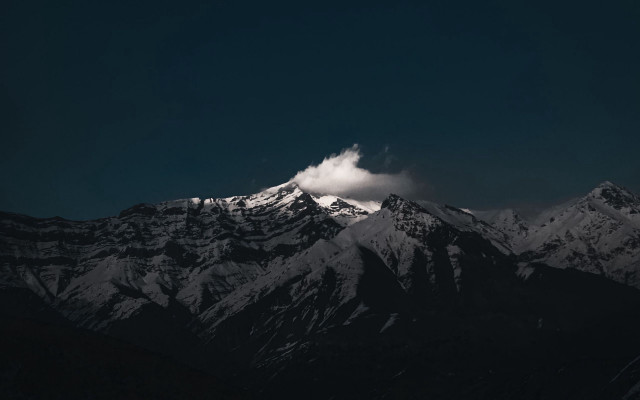 Snowy mountain range dark sky free wallpaper for desktop - medium preview image
