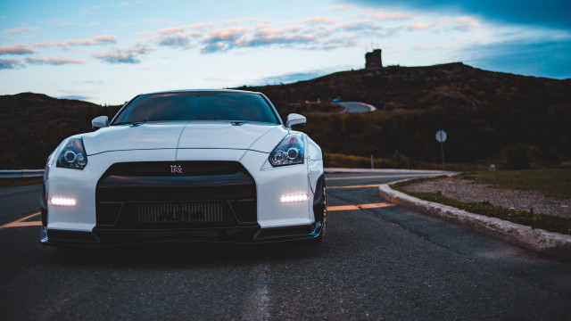 White sports car dusk clouds free wallpaper for desktop - medium preview image