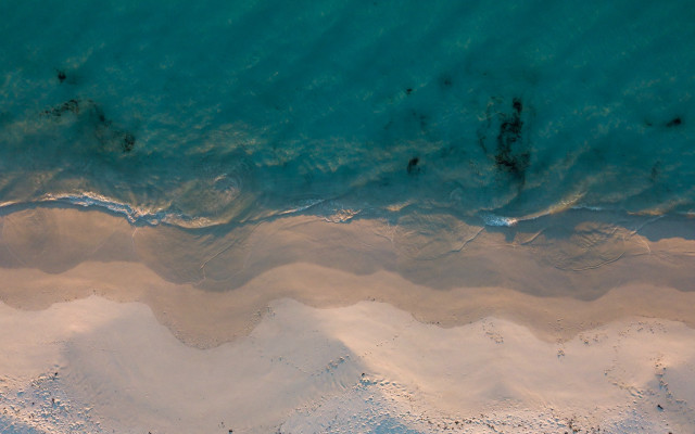 Beach ocean sand boat people free wallpaper for desktop - medium preview image