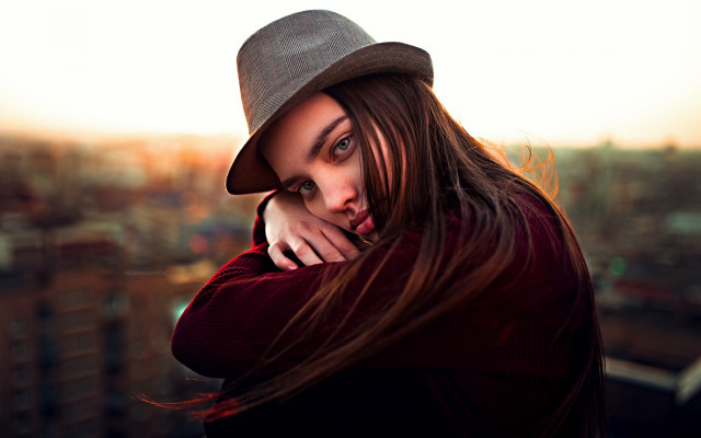 Woman hat city blurry portrait free wallpaper for desktop - medium preview image
