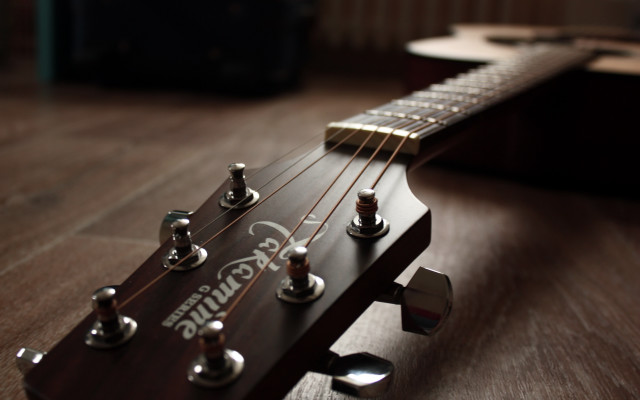 Guitar neck wooden floor blurry free wallpaper for desktop - medium preview image