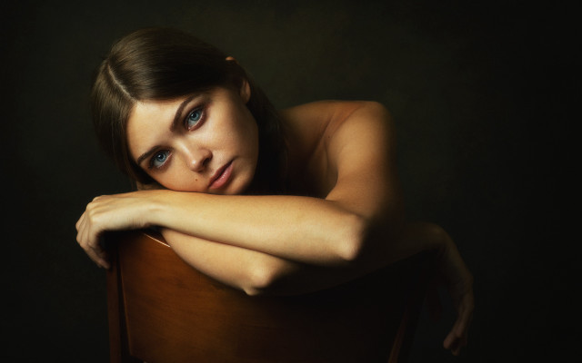 Woman crossed arms chair blue free wallpaper for desktop - medium preview image