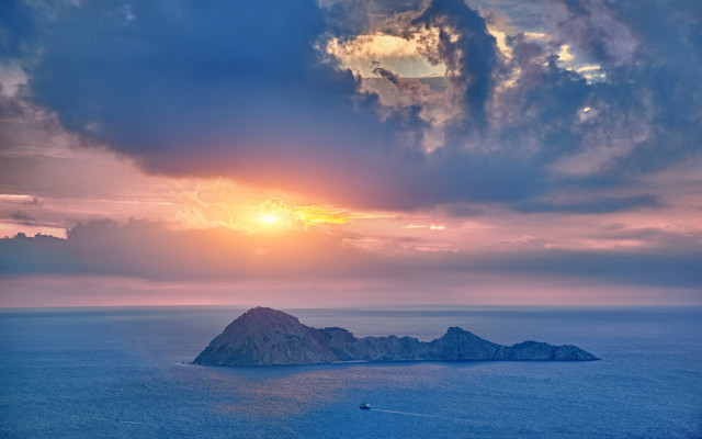 Sunset island ocean boat mystical free wallpaper for desktop - medium preview image