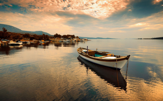 Boat shore houses cloudy sky free wallpaper for desktop - medium preview image