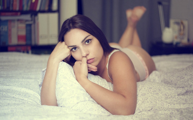 Woman laying bed blurry purple free wallpaper for desktop - medium preview image