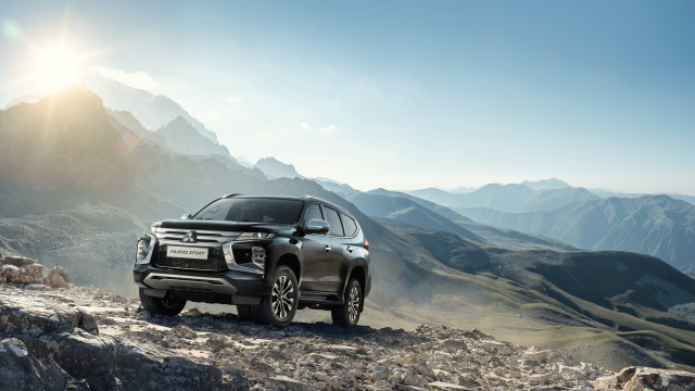 Black suv mountain road landscape free wallpaper for desktop - medium preview image