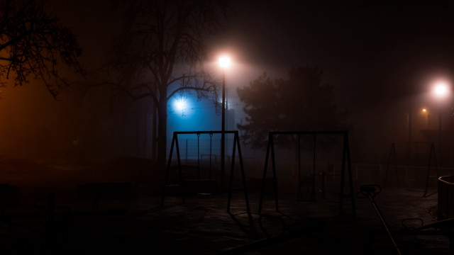 Foggy night playground swing streetlights free wallpaper for desktop - medium preview image