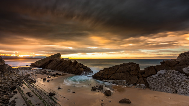 Beach rocks water cloudy sunset #2 free wallpaper for desktop - medium preview image