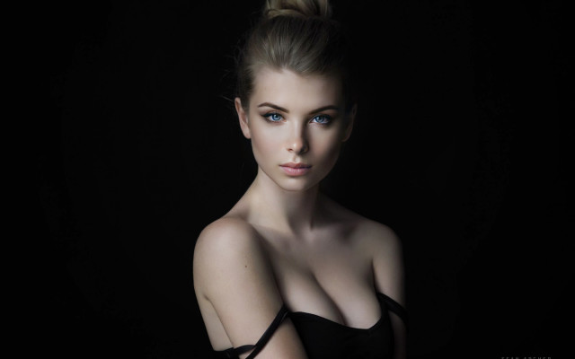 Woman bun blueeyes dark background free wallpaper for desktop - medium preview image