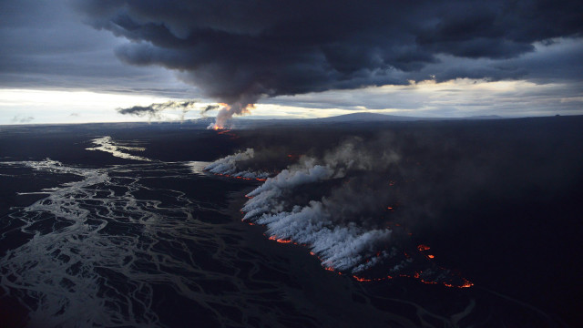 Volcano smoke steam ocean night free wallpaper for desktop - medium preview image