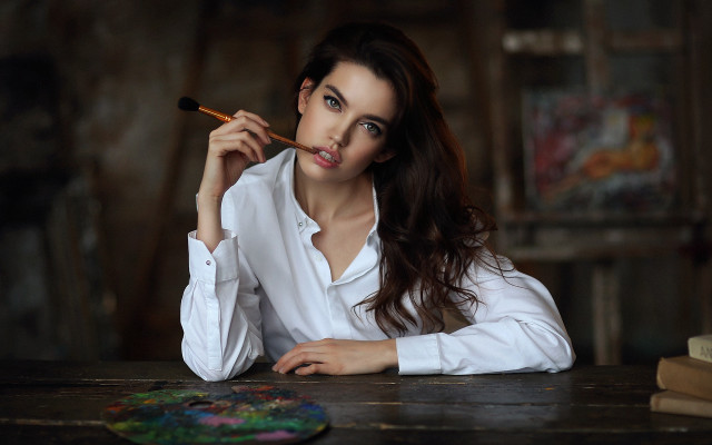 Woman sitting artist portrait blurry free wallpaper for desktop - medium preview image