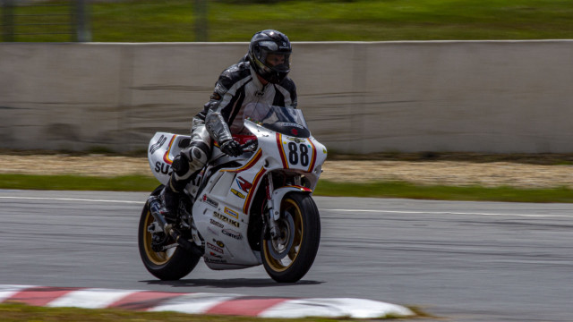 Man motorcycle race track helmet #2 free wallpaper for desktop - medium preview image