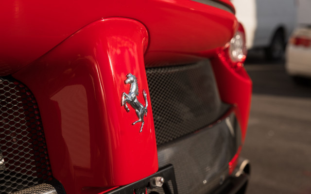 Red car chrome horse emblem free wallpaper for desktop - medium preview image