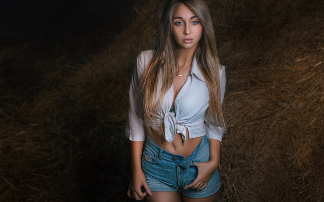 Woman blue shorts hayfield portrait free wallpaper for desktop - medium preview image