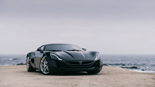Black sports car beach ocean free wallpaper for desktop - medium preview image