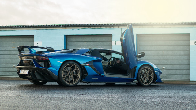 Blue sports car garage door #2 free wallpaper for desktop - medium preview image