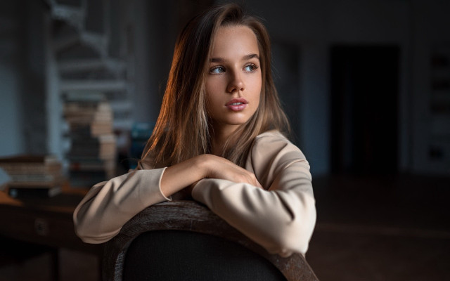 Serious woman chair crossed arms #2 free wallpaper for desktop - medium preview image