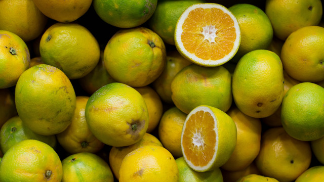 Lemons halved eaten pile orange free wallpaper for desktop - medium preview image