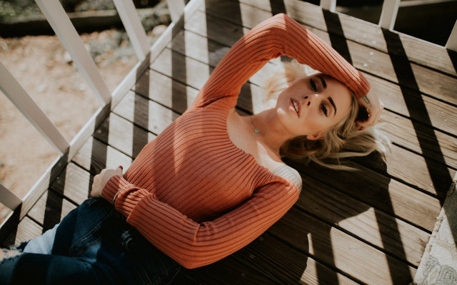 Woman smiling bench blonde denim free wallpaper for desktop - medium preview image