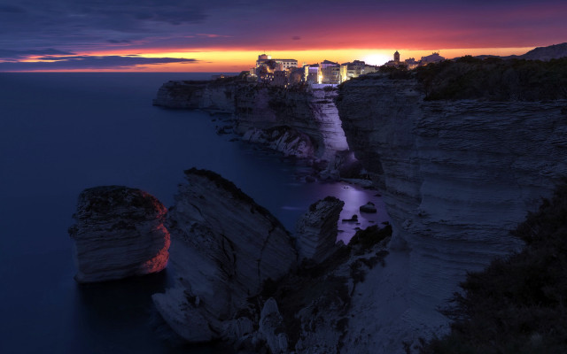 Sunset city cliff ocean red free wallpaper for desktop - medium preview image