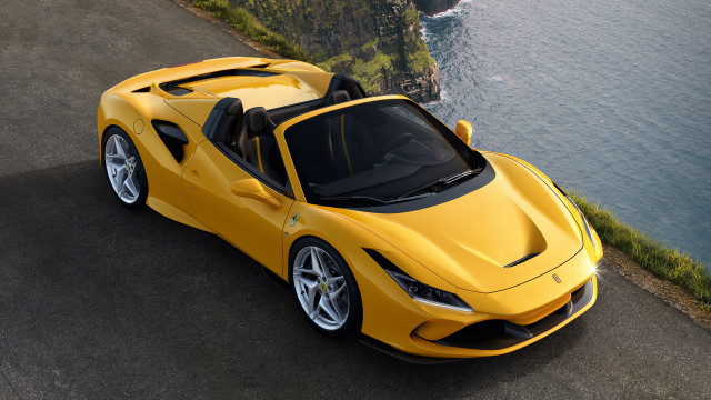 Yellow sports car cliffs water free wallpaper for desktop - medium preview image