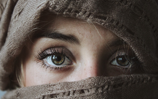 Woman scarf concerned eyes photorealistic free wallpaper for desktop - medium preview image
