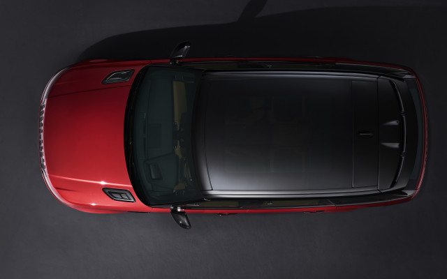 Red car tiltshift photorealism black free wallpaper for desktop - medium preview image