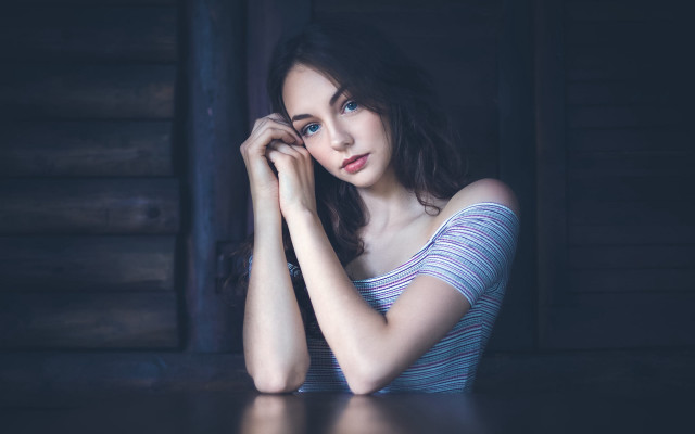 Woman serious look blue eyes free wallpaper for desktop - medium preview image