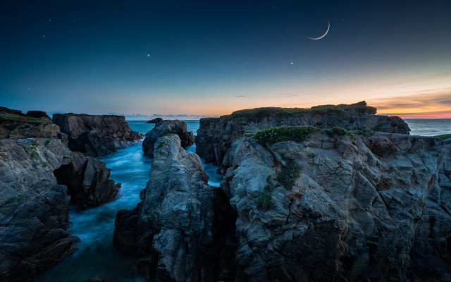 Moon ocean cliffs rocks night free wallpaper for desktop - medium preview image