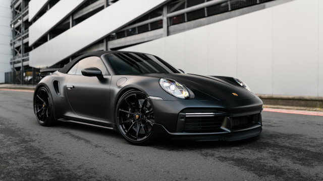 Grey sports car parked white free wallpaper for desktop - medium preview image