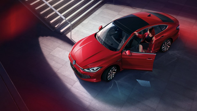 Red car parked open driver free wallpaper for desktop - medium preview image