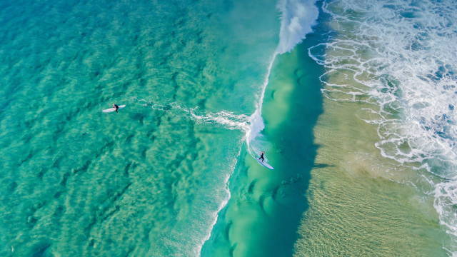 Surfing couple green ocean impressionist free wallpaper for desktop - medium preview image