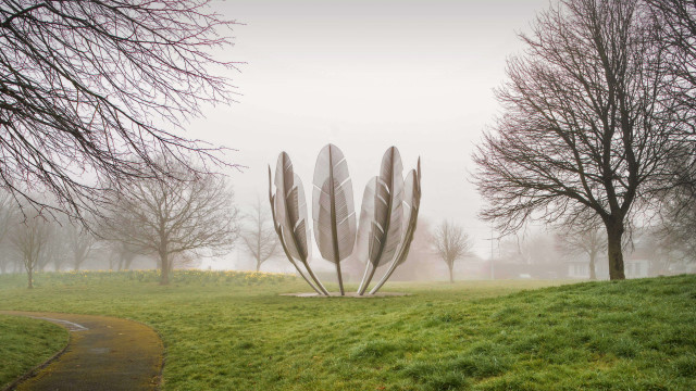 Metal sculpture grassy field fog free wallpaper for desktop - medium preview image