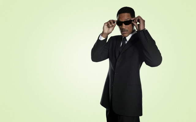 Man suit sunglasses serious adjusting free wallpaper for desktop - medium preview image