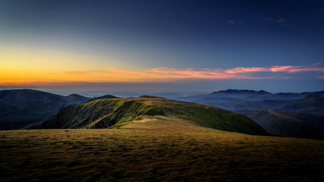 Grassy hill sunset clouds lake free wallpaper for desktop - medium preview image