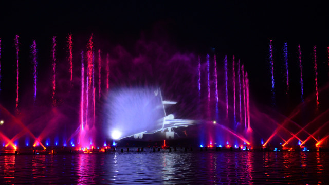 Colorful lights water jets night free wallpaper for desktop - medium preview image