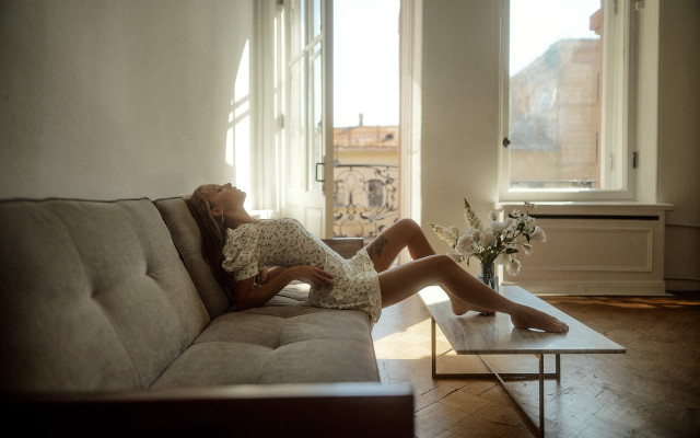 Woman couch livingroom photorealistic natural free wallpaper for desktop - medium preview image