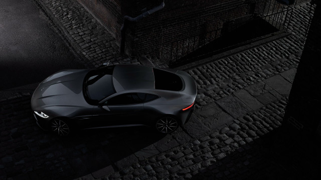 Black sports car cobblestone night free wallpaper for desktop - medium preview image