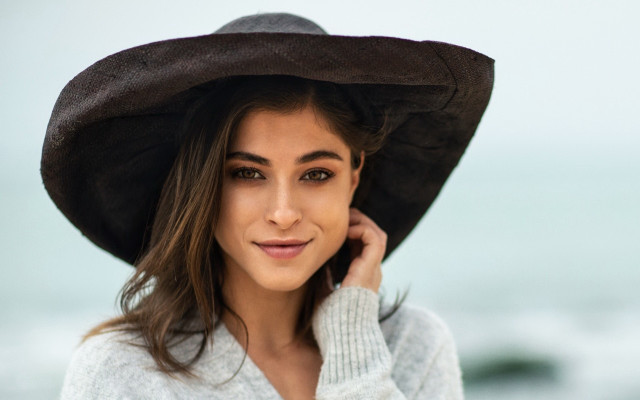 Woman hat sweater beach phone free wallpaper for desktop - medium preview image