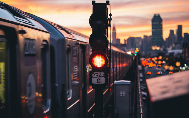 Train city sunset blurry background free wallpaper for desktop - medium preview image