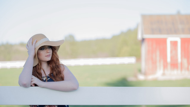 Woman hat fence barn outdoor free wallpaper for desktop - medium preview image