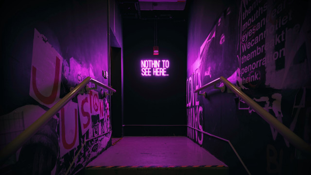 Purple light stairwell down sign free wallpaper for desktop - medium preview image