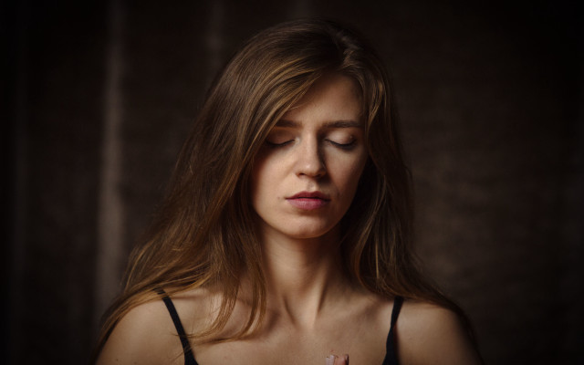 Prayer woman closed eyes dark free wallpaper for desktop - medium preview image