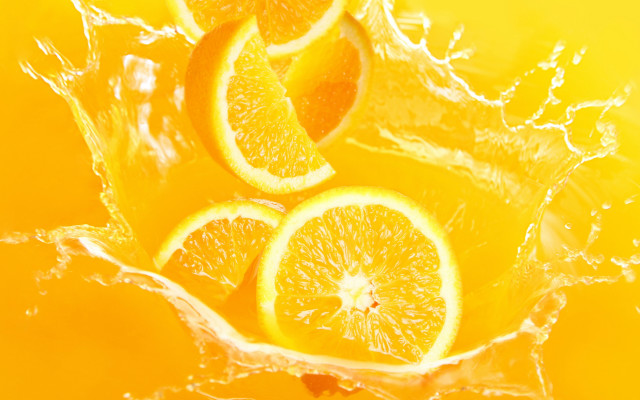 Orange water splashing group yellow free wallpaper for desktop - medium preview image