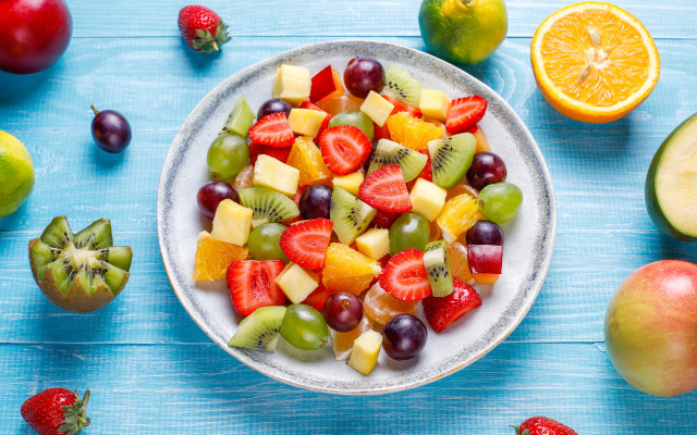 Bowl fruit surrounded blue tablecloth free wallpaper for desktop - medium preview image
